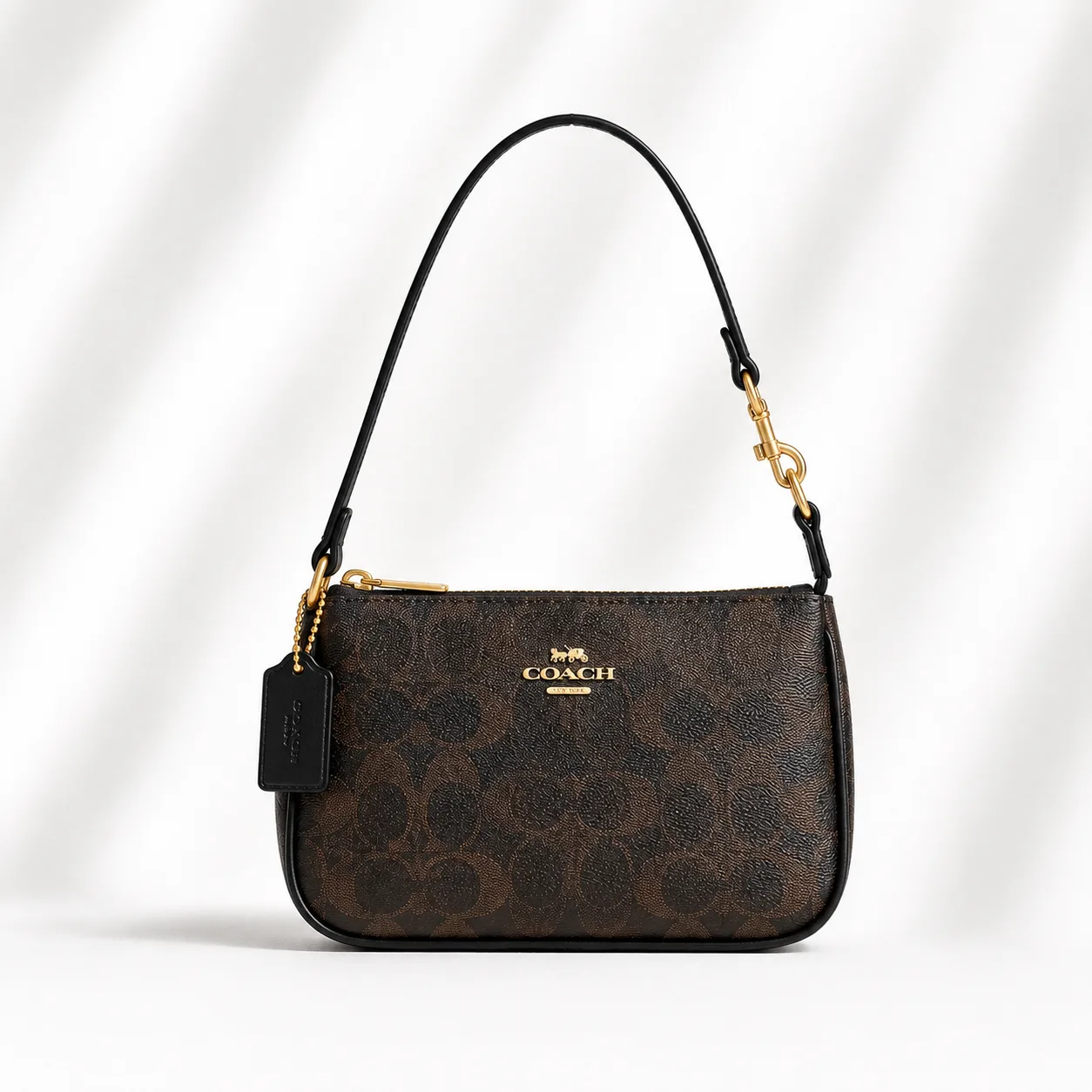 Coach Nolita 19 in Signature Canvas in Brown / Black